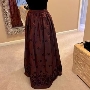 Floor length evening skirt in beautiful wine color with flocked roses scattered.